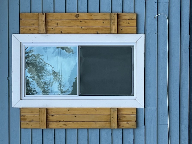 Custom board & batten shutters.
