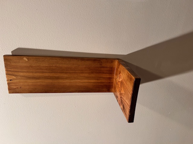 Simple shelf. Comes in any stain color.